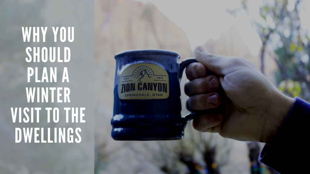 Person holding Zion Canyon mug outdoors in winter.