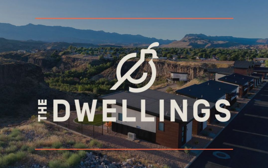 The Dwellings housing community with mountainous backdrop