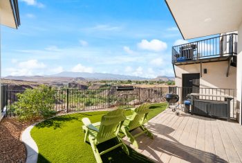 Scenic backyard patio with mountain view.