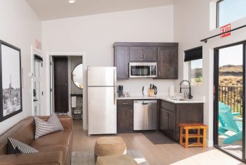 Modern studio apartment interior with open layout.